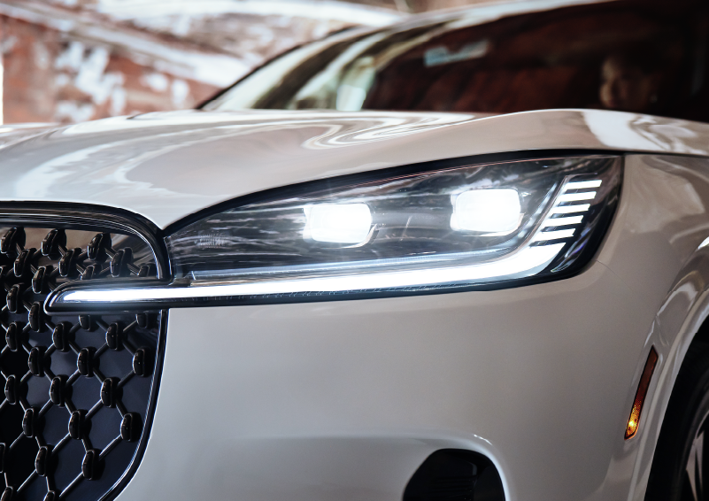 A close-up of a headlamp on the 2025 Lincoln Aviator® SUV is shown. | Uptown Lincoln in Wauwatosa WI