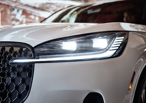 A close-up of a headlamp on the 2025 Lincoln Aviator® SUV is shown. | Uptown Lincoln in Wauwatosa WI