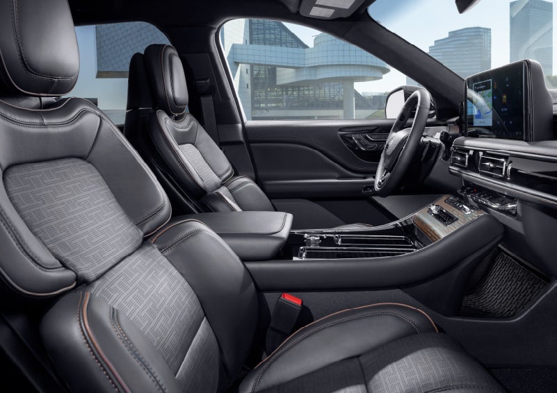 The interior of the 2025 Lincoln Aviator® SUV is shown with sleek black accents. | Uptown Lincoln in Wauwatosa WI