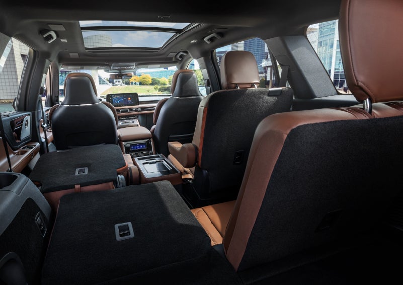 The interior of the 2025 Lincoln Aviator® SUV is shown with two seats folded down for added space. | Uptown Lincoln in Wauwatosa WI