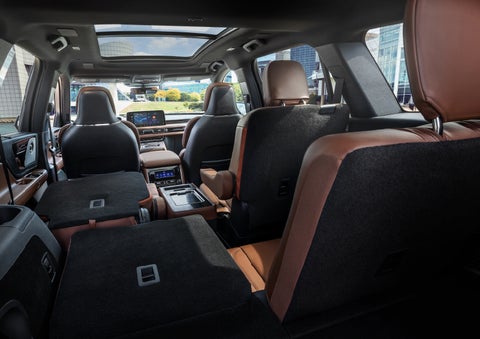 The interior of the 2025 Lincoln Aviator® SUV is shown with two seats folded down for added space. | Uptown Lincoln in Wauwatosa WI