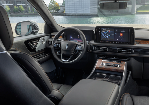 The interior of the 2025 Lincoln Aviator® SUV is shown parked with a view of a harbor through the windshield. | Uptown Lincoln in Wauwatosa WI