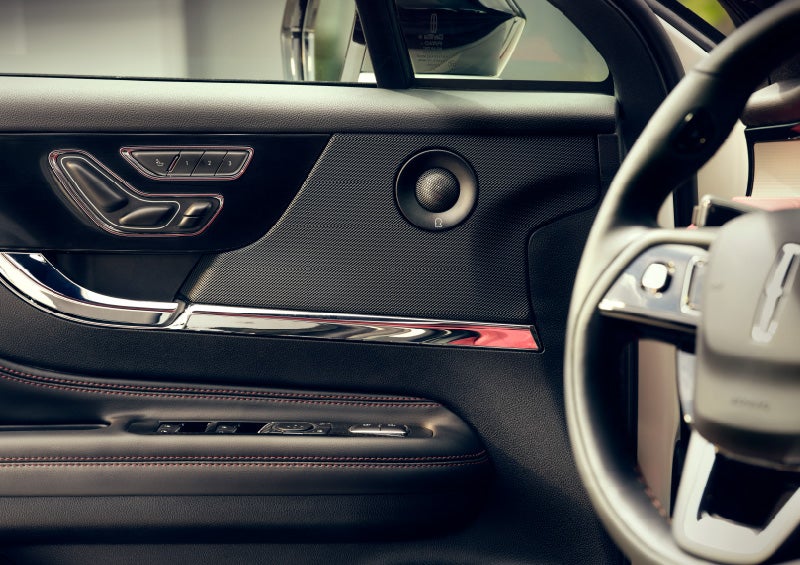 An audio speaker is shown in the driver's side door of a 2025 Lincoln Corsair® SUV.