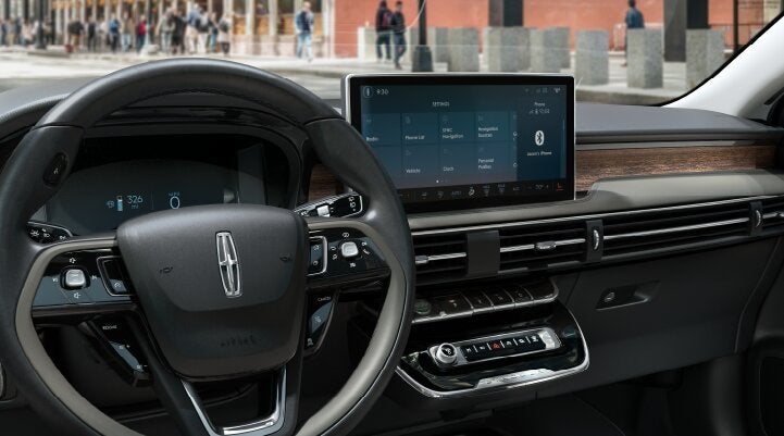 The center screen of the new 2025 Lincoln Corsair® SUV is showcased with its SYNC® 4 capabilities highlighted | Uptown Lincoln in Wauwatosa WI