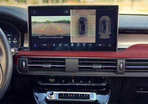 The driver of a 2024 Lincoln Corsair® SUV is shown selecting the drive mode. | Uptown Lincoln in Wauwatosa WI