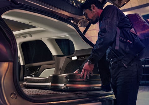 The driver of a 2024 Lincoln Corsair® SUV is shown selecting the drive mode. | Uptown Lincoln in Wauwatosa WI