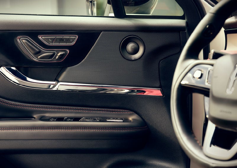 An audio speaker is shown in the driver's side door of a 2024 Lincoln Corsair® SUV. | Uptown Lincoln in Wauwatosa WI