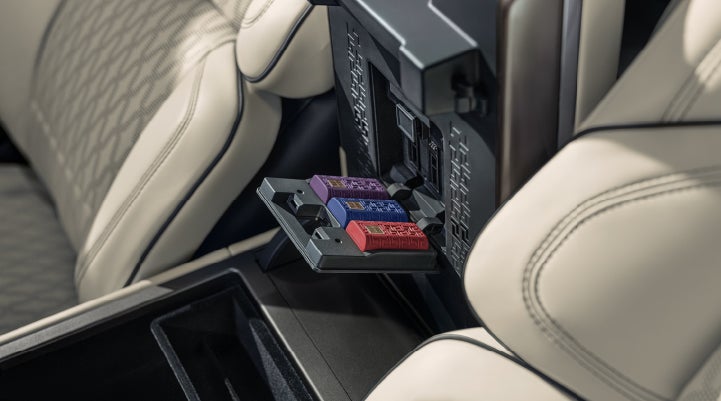 Digital Scent cartridges are shown in the diffuser located in the center arm rest. | Uptown Lincoln in Wauwatosa WI