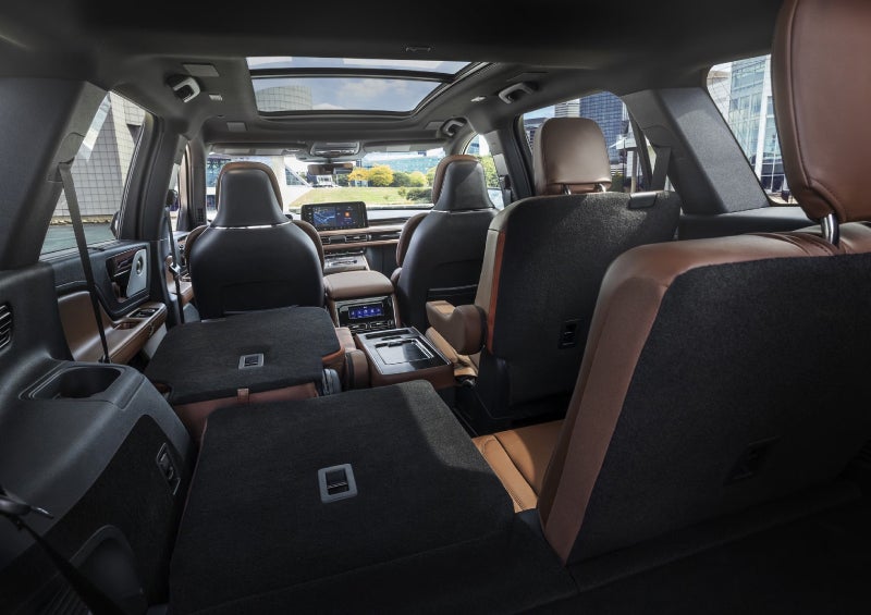 One side of the PowerFold® third-row seat and a second-row seat are folded forward in the 2026 Lincoln Aviator® SUV. | Uptown Lincoln in Wauwatosa WI