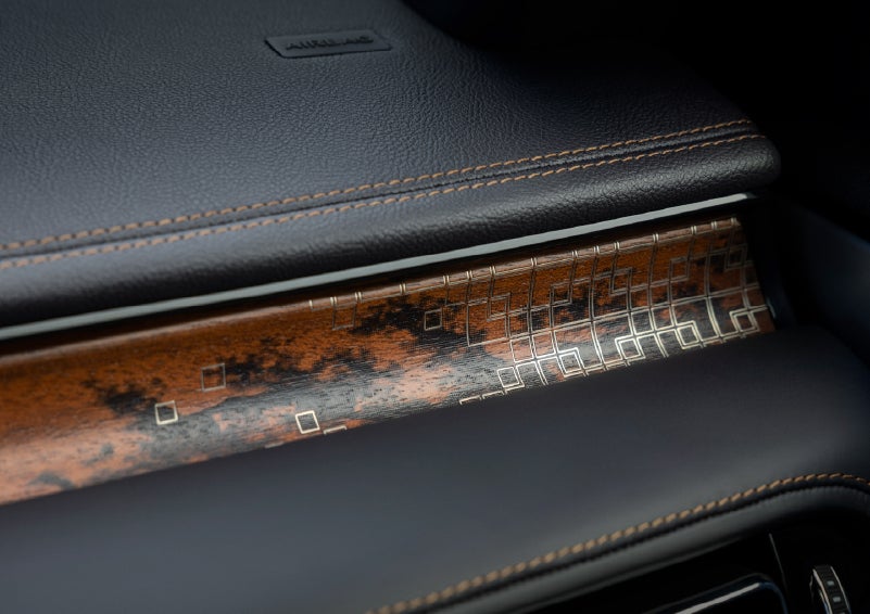 A close-up shot of the 2026 Lincoln Aviator® dashboard with unique black and brown accents and brown stitching. | Uptown Lincoln in Wauwatosa WI