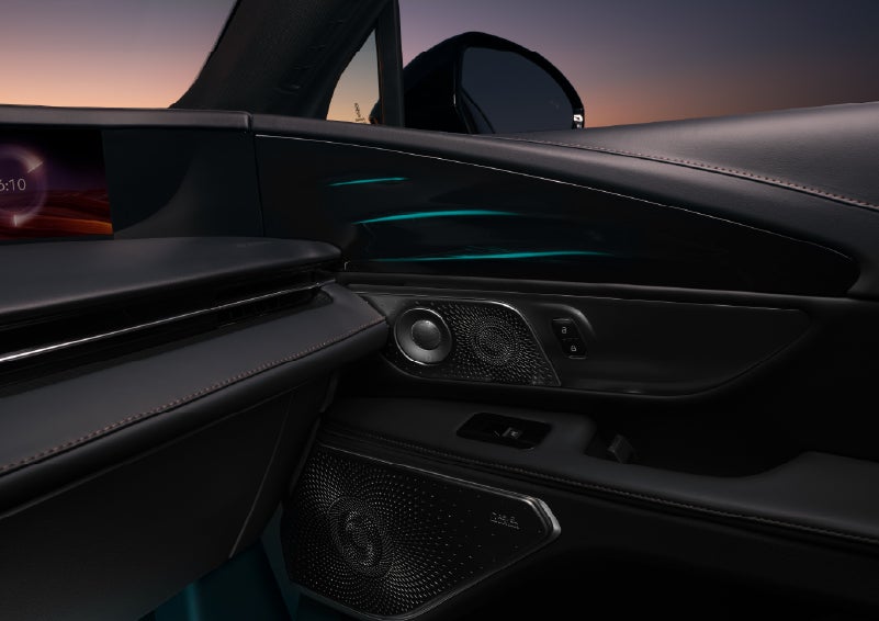Selectable ambient lighting glows in the passenger door panel. | Uptown Lincoln in Wauwatosa WI